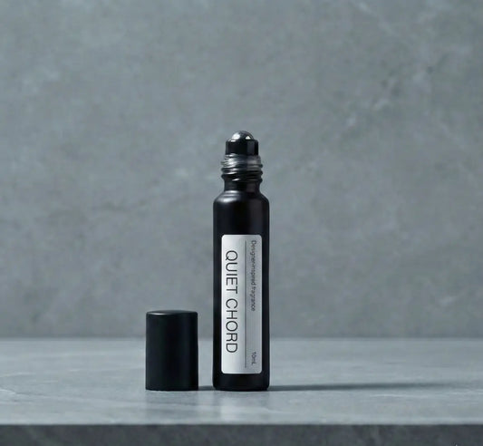 Best Aesop Tacit alternative perfume oil, Quiet Chord woody aromatic travel spray, Yuzu and basil botanical fragrance ingredients, Scent layering guide for fresh perfumes.