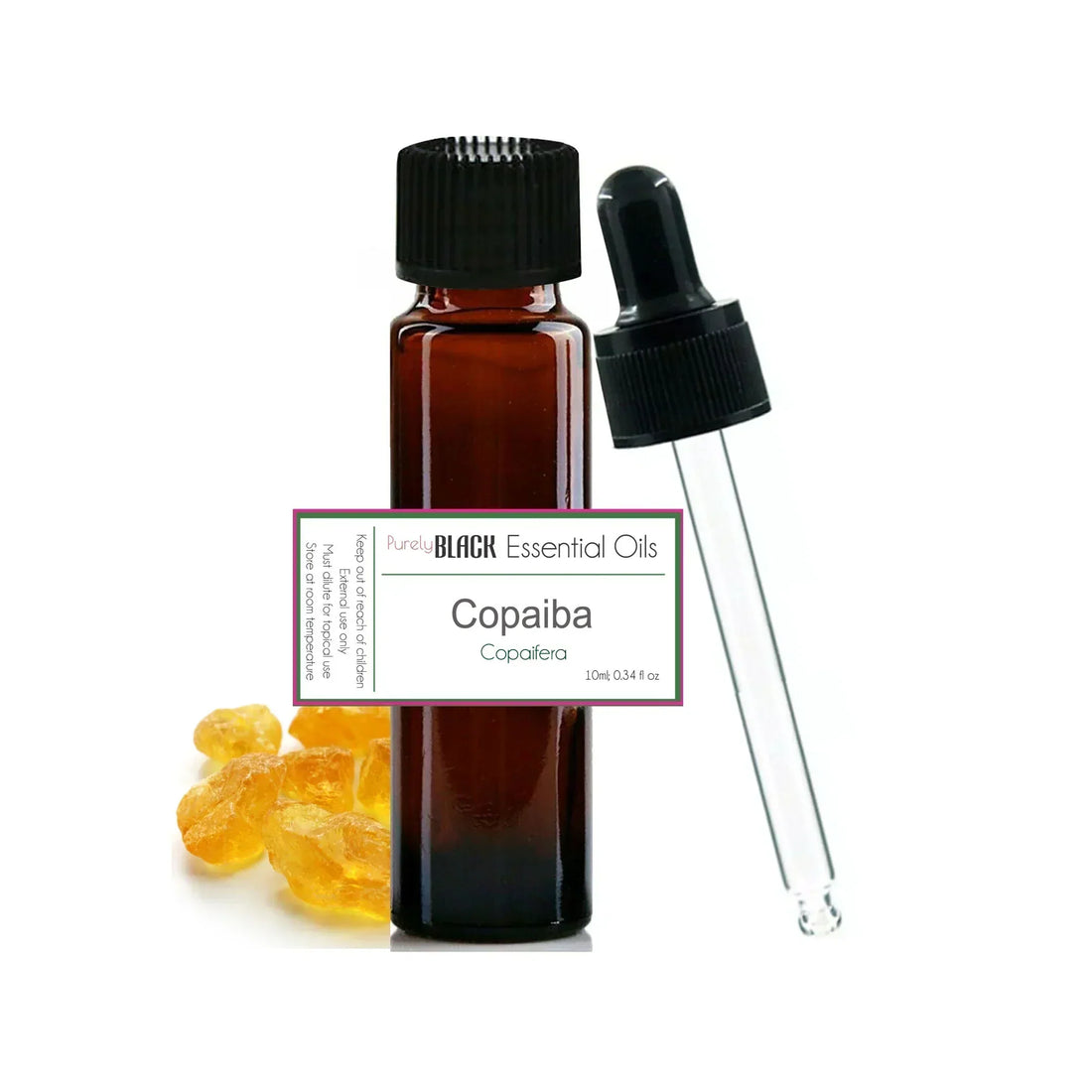 A bottle of pure Copaiba oil resting on a massage table alongside fractionated coconut oil for joint comfort in Australia.