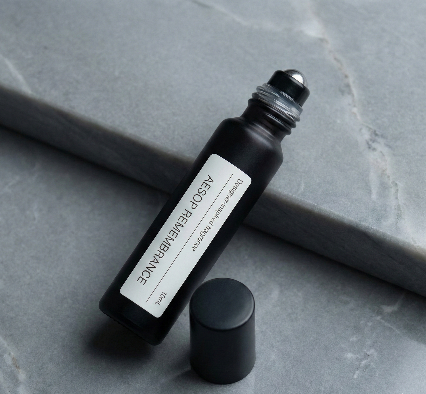 Citrus woody perfume in minimalist black bottle, REMEMBRANCE Aesop RESURRECTION alternative